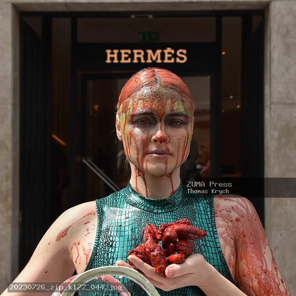 Tash Peterson Dumps 'Guts' Outside Hermès in Crusade Against
